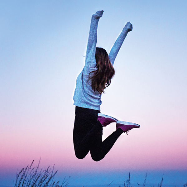 Woman jumping for joy